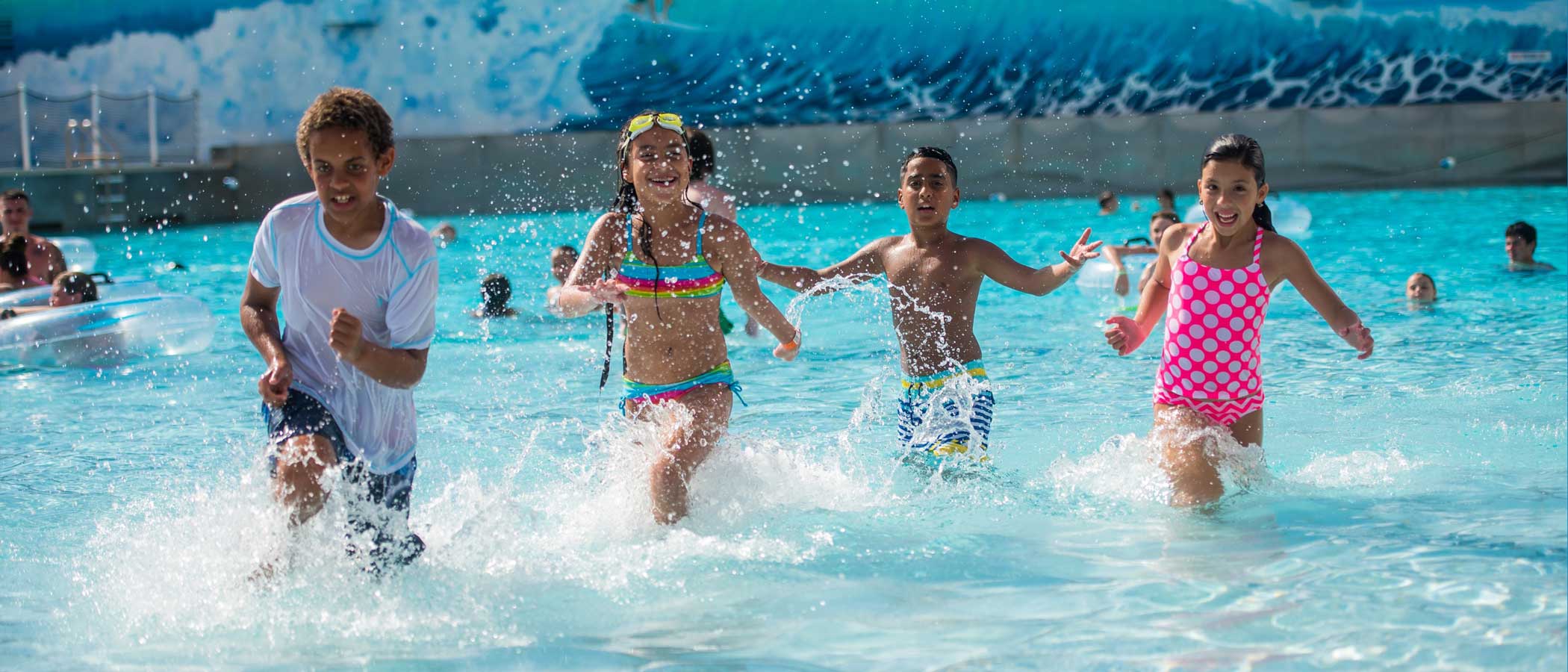 Kids Running Through Water