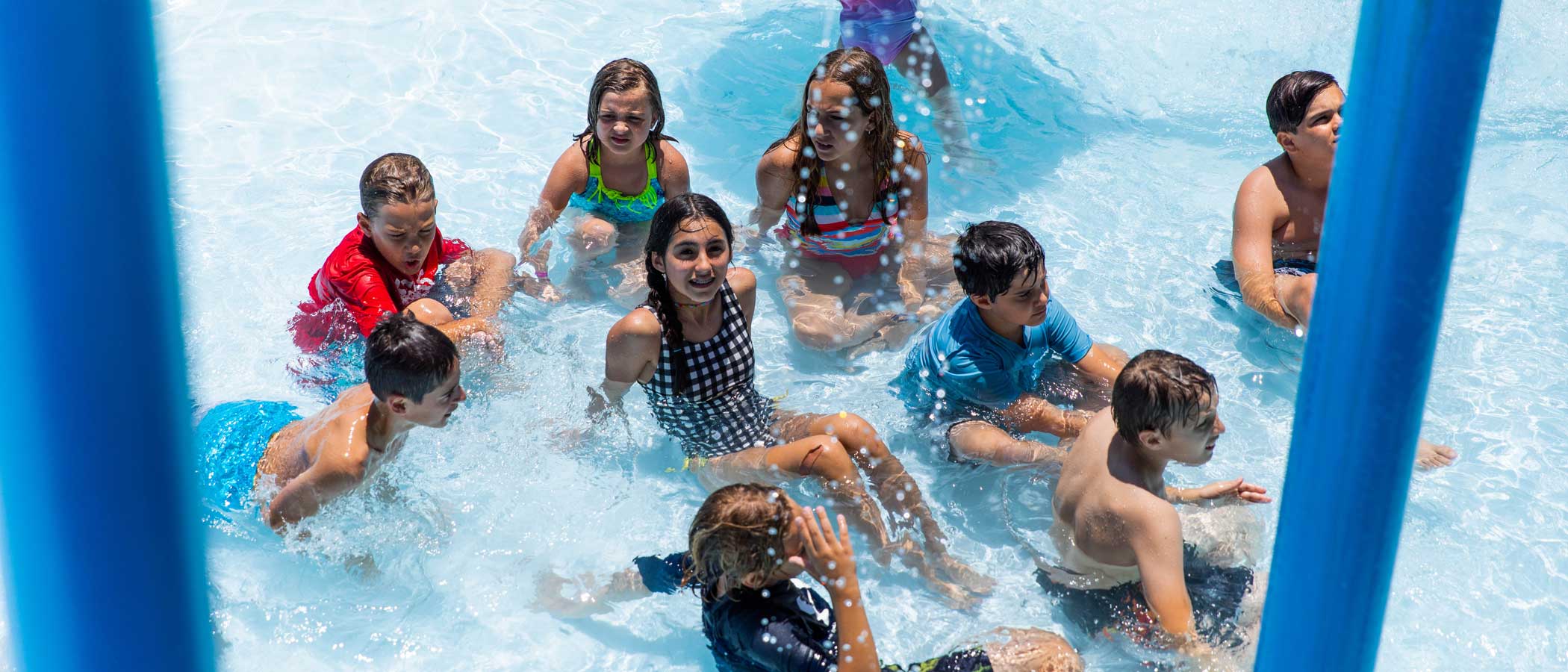 Kids Running Through Water